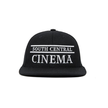 Black cap with 'South Central Cinema' text on a white background